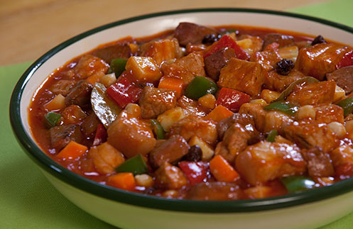 https://api.lifegetsbetter.ph/uploads/articles/featured/del-monte-kitchenomics-5-tasty-tomato-based-meals-for-the-family-classic-menudo-with-raisins-497x323.jpg